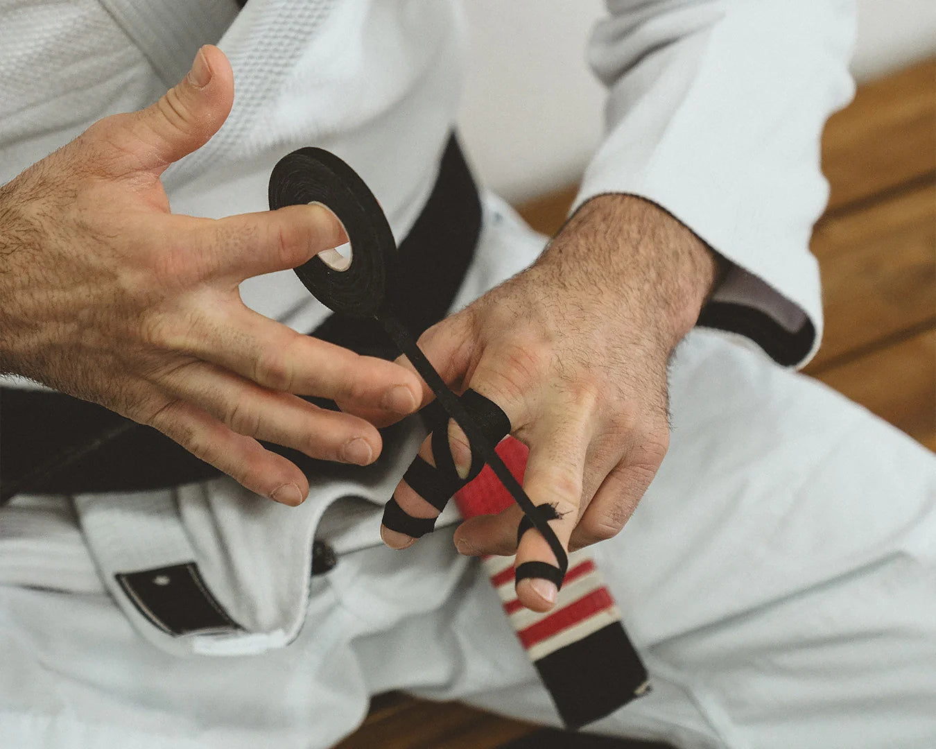 How to Tape Fingers for BJJ: The Beginner’s Guide to Grip Preservation & Longevity