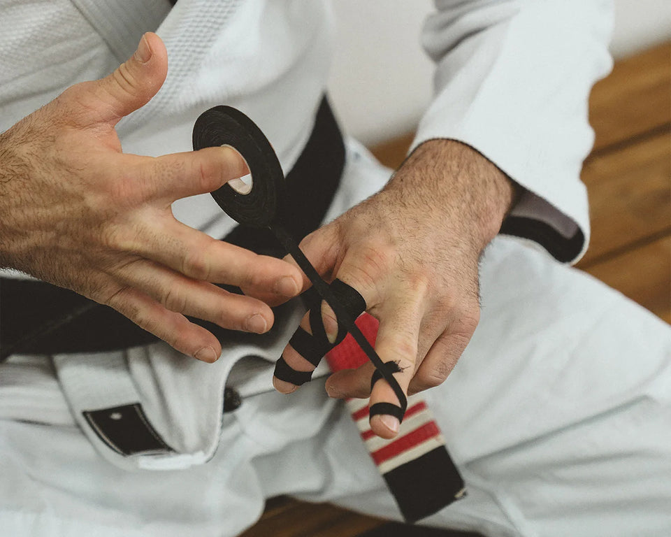 How to Tape Fingers for BJJ: The Beginner’s Guide to Grip Preservation & Longevity
