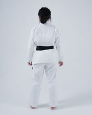 Kingz Born to Rule Women's Jiu Jitsu Gi White - Back View Female Athlete Embroidered "Born to Rule" Text Back Black Belt Contrast Clean Design Durable Fabric BJJ Gi Training [color:White]
