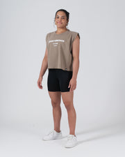 Kingz HQ Women's Crop Tank Brown - Full Body Front View Female Athlete Sleeveless Brown Crop Top KINGZ Kimonos Text Chest Relaxed Fit Streetwear [color:Brown]