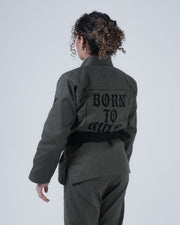 Kingz Born to Rule Women's Jiu Jitsu Gi Military Green - Back View Female Athlete Black "BORN TO RULE" Text Panel Durable Weave Tailored Fit BJJ Gi Training [color:Military Green]