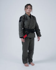 Kingz Born to Rule Women's Jiu Jitsu Gi Military Green - Full Body Front View Female Athlete Black Shoulder Patches Embroidered Chest Logo Black Belt Contrast Stitching Durable Fabric BJJ Gi Training [color:Military Green]
