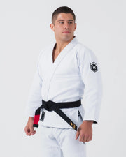 Kingz Balistico 4.0 Brazilian Jiu Jitsu Gi White - Front View Male Athlete Black Belt Crown Badge Left Sleeve Patch Durable Weave White Fabric Classic Fit BJJ Gi Training [color:White]