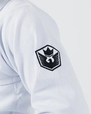 Kingz Balistico 4.0 BJJ Gi White upper arm closeup showing detailed black crown shield crest patch