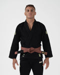 Kingz The ONE V2 LE BJJ Gi Black Green front view showing brown belt and green accent crown logos