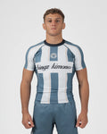Kingz Vintage Futebol Rashguard Blue White Stripe - Full Body Front View Male Athlete Short Sleeve Retro Football Kit Vertical Stripes Kingz Kimonos Cursive Text Crest Badge