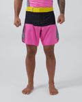 Kingz Retro Shorts Hot Pink Black Yellow - Full Body Front View Male Athlete Bold Color Block Grappling Shorts Black Upper Panel Hot Pink Lower Panel Yellow Elastic Waistband Black White Checkerboard Side Panel Inserts Crown Logo Matching Hot Pink Rashguard Bare Feet Men's No-Gi BJJ Retro Collection