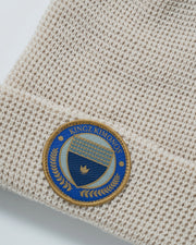 Kingz BJJ Club Waffle Knit Beanie Tan - Close-Up Detail View Tan Waffle Knit Texture Blue Gold Kingz Kimonos Circular Patch Front Streetwear [color:Tan]