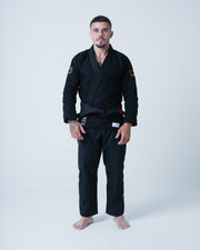Kingz Legends Never Die Respect Gi - Black - Full Body Front View Male Athlete Black Gi Gold Crown Shoulder Embroidery Patch Black Belt Classic Fit BJJ Training Gi [color:Black]