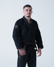 Kingz Legends Never Die Respect Gi - Black - Full Body Front View Male Athlete Black Gi Gold Crown Shoulder Patch Kingz Logo Patch Waist Durable Stitching Classic Fit BJJ Gi [color:Black]
