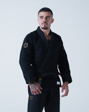 Kingz Legends Never Die Respect Gi - Black - Front View Male Athlete Gold Crown Shoulder Patch Black Belt Kingz Logo Patch Lapel Gold Crown Pants BJJ Gi Training [color:Black]