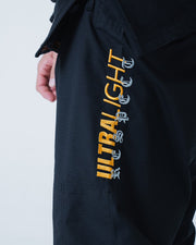 Kingz Legends Never Die Respect Gi Black - Close-Up Side View Embroidered ULTRALIGHT Text Vertical Orange Gray Contrast Durable Fabric Design BJJ Gi Training Apparel [color:Black]