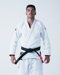 Kingz Legends Never Die Respect Gi - White - Full Body Front View Male Athlete White Gi Black Belt Crown Logo Shoulder Patch Contrast Stitching BJJ Training Gi [color:White]