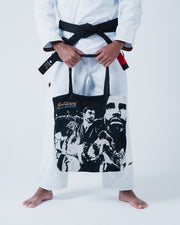 Kingz Legends Never Die Respect Gi - White - Waist Down Front View Male Athlete Black Belt Black Tote Bag Graphic Print "Respect is Earned Not Given" Text BJJ Gi Training [color:White]