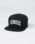 Kingz Slice Snapback - Black - Angled Front View Black Hat Bold White KINGZ Text Flat Brim Structured Crown Embroidered Logo Casual Streetwear BJJ Training Apparel [color:Black]