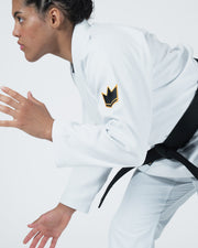 Kingz Legends Never Die Respect Women's Gi - White - Side View Female Athlete Black Crown Badge Sleeve Textured Fabric Black Belt BJJ Gi Training [color:White]