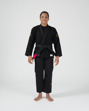 Kingz Legends Never Die Respect Women's Gi - Black - Full Body Front View Female Athlete Black Gi Gold Crown Shoulder Patch Black Belt Pink Rank Tab Durable Stitching BJJ Training Gi [color:Black]