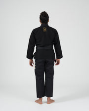 Kingz Legends Never Die Respect Women's Gi - Black - Full Body Back View Female Athlete Yellow Crown Logo Upper Back Embroidered Side Pants Detailing Durable Fabric BJJ Gi Training [color:Black]