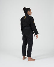 Kingz Legends Never Die Respect Women's Gi - Black - Back View Female Athlete Gold Crown Logo Embroidered Shoulders Black Belt Tailored Fit Durable Fabric BJJ Gi Training [color:Black]