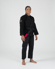 Kingz Legends Never Die Respect Women's Gi Black - Full Body Front View Female Athlete Black Gi Gold Crown Badge Shoulder and Thigh Black Belt Traditional Fit BJJ Gi Training [color:Black]