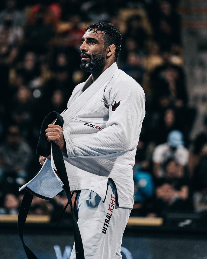 Leandro Lo holding his black belt